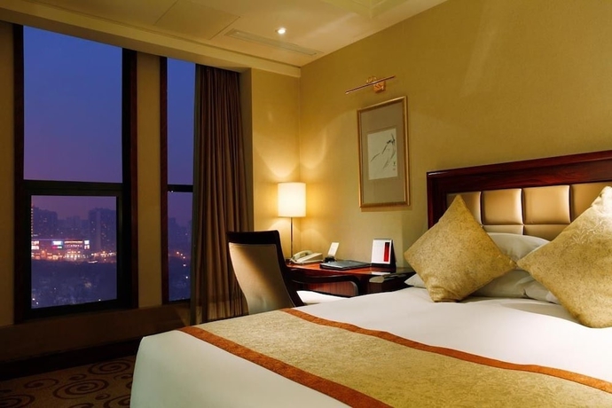 Imagen de la habitación del Hotel Guidu Beijing. Foto 4
