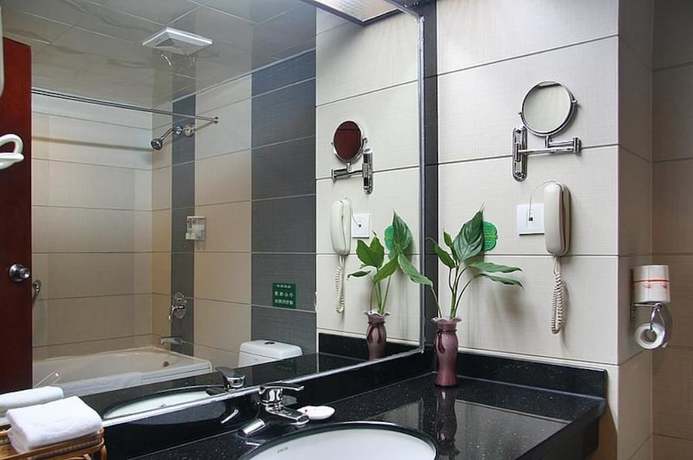 Imagen de la habitación del Hotel Guifu Hotel. Foto 4