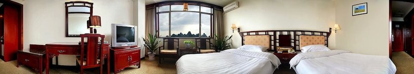 Imagen de la habitación del Hotel Guifu Hotel. Foto 6