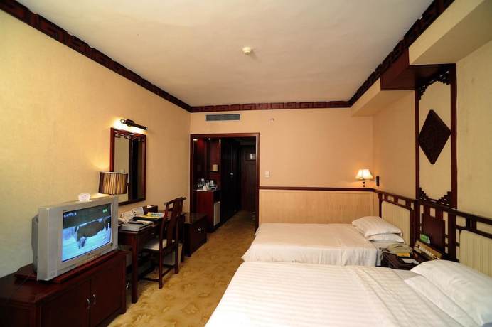 Imagen de la habitación del Hotel Guifu Hotel. Foto 9