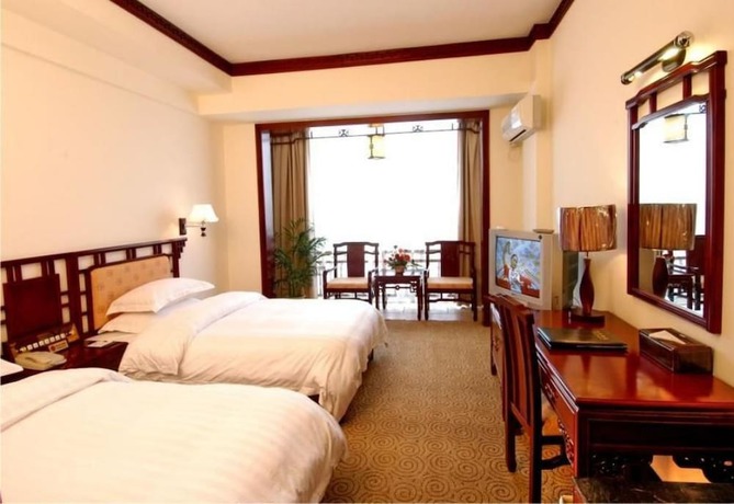 Imagen de la habitación del Hotel Guifu Hotel. Foto 10