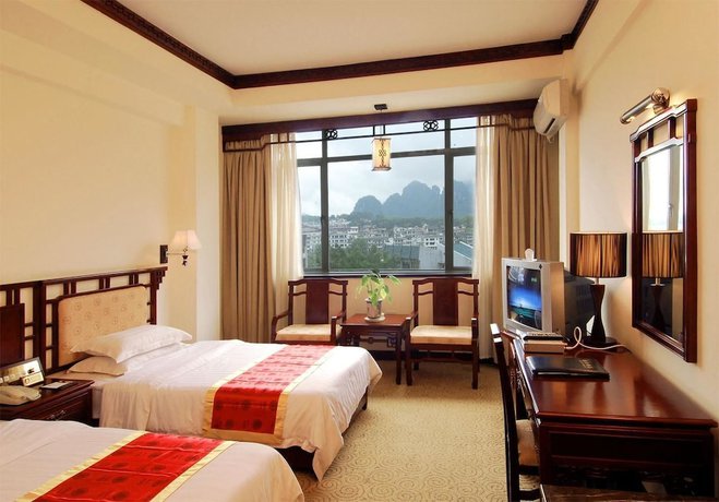 Imagen de la habitación del Hotel Guifu Hotel. Foto 13