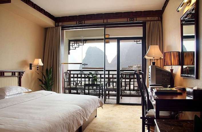 Imagen de la habitación del Hotel Guifu Hotel. Foto 14