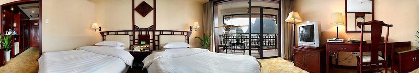 Imagen de la habitación del Hotel Guifu Hotel. Foto 17