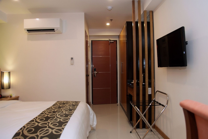 Imagen de la habitación del Hotel Guijo Suites Makati. Foto 3