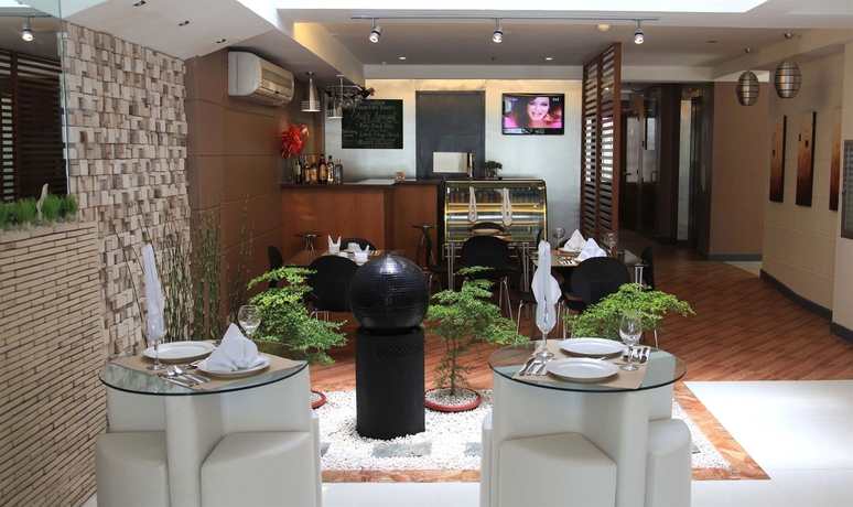 Imagen del bar/restaurante del Hotel Guijo Suites Makati. Foto 2