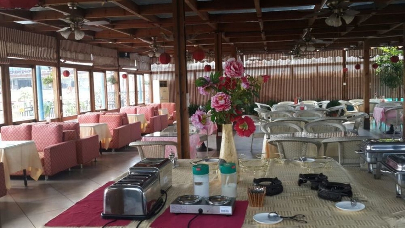 Imagen del bar/restaurante del Hotel Guilin Eva Inn. Foto 1