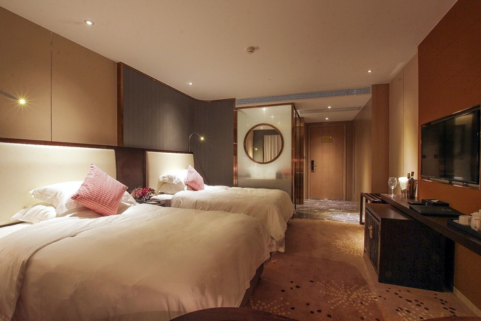 Imagen de la habitación del Hotel Guilin Exhibition International Boutique. Foto 11