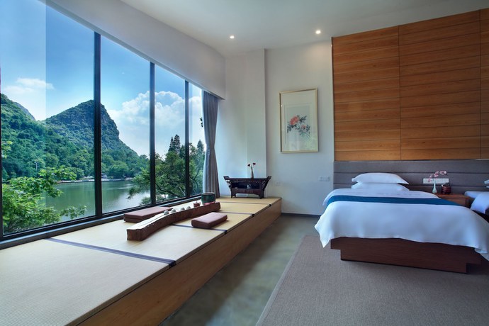 Imagen de la habitación del Hotel Guilin Heshe. Foto 8