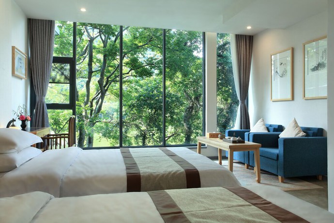 Imagen de la habitación del Hotel Guilin Heshe. Foto 15