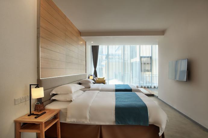 Imagen de la habitación del Hotel Guilin Heshe. Foto 16