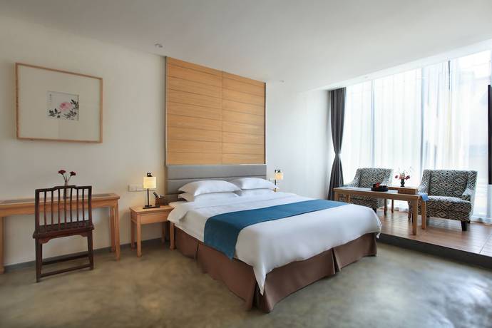 Imagen de la habitación del Hotel Guilin Heshe. Foto 17
