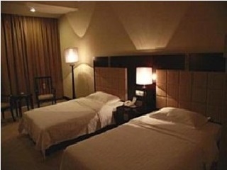 Imagen de la habitación del Hotel Guilin International. Foto 9