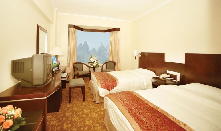 Imagen de la habitación del Hotel Guilin Osmanthus. Foto 7