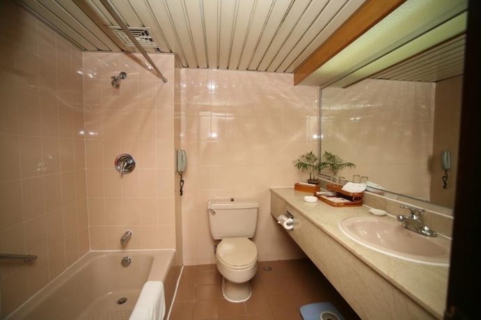 Imagen de la habitación del Hotel Guilin Osmanthus. Foto 17