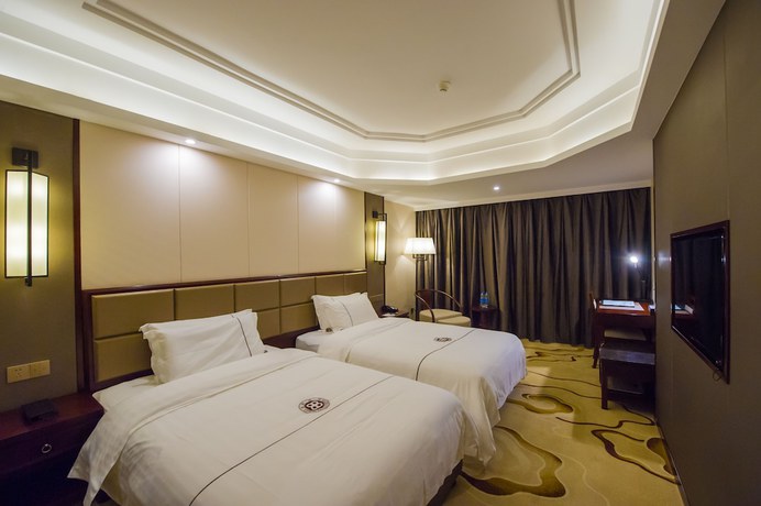 Imagen de la habitación del Hotel Guilin Tailian. Foto 2