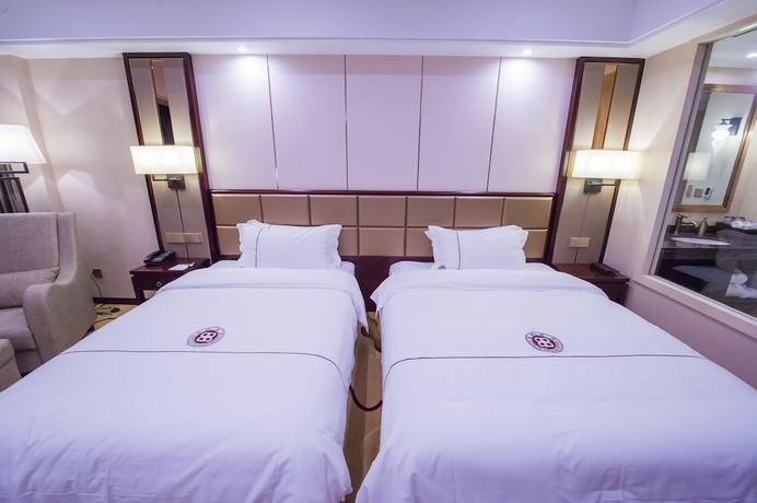 Imagen de la habitación del Hotel Guilin Tailian. Foto 13