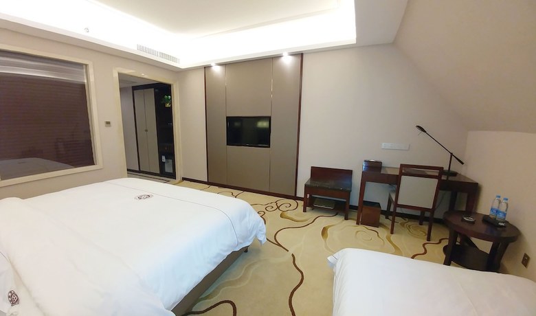 Imagen de la habitación del Hotel Guilin Tailian. Foto 15
