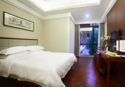 Imagen de la habitación del Hotel Guilin Zizhou Panorama Resort. Foto 6