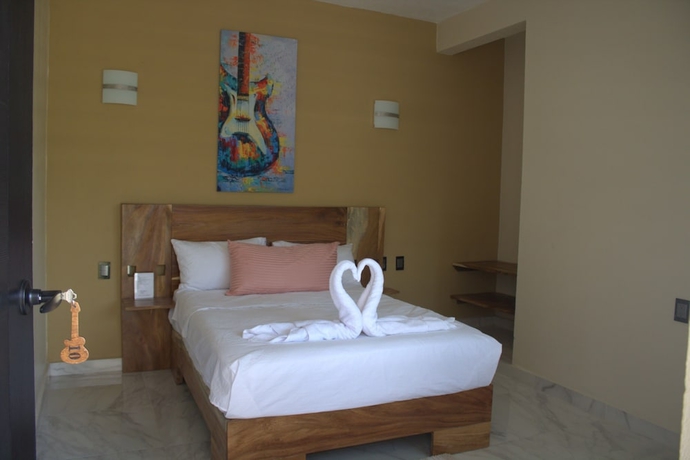 Imagen de la habitación del Hotel Guitarra Inn. Foto 16