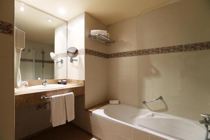 Imagen de la habitación del Hotel Guitart Central Park Aqua Resort. Foto 11