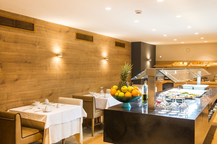 Imagen del bar/restaurante del Hotel Guitart Grand Passage. Foto 2