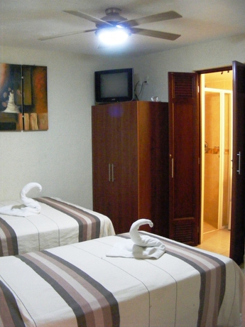 Imagen de la habitación del Hotel Guiv&aacute; Huatulco. Foto 5