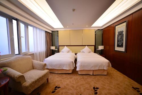 Imagen de la habitación del Hotel Guizhou. Foto 15