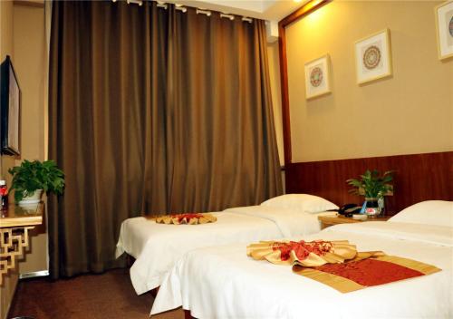 Imagen de la habitación del Hotel Gujun. Foto 6