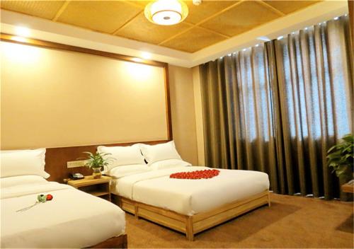 Imagen de la habitación del Hotel Gujun. Foto 8