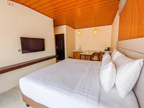 Imagen de la habitación del Hotel Gulala Azana & Resort Guci Tegal. Foto 19