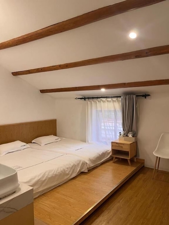 Imagen de la habitación del Hotel Gulangyu Sunlit Rock Garden Resort. Foto 1