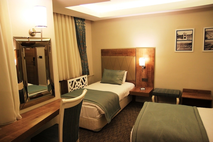 Imagen de la habitación del Hotel Guleryuz Otel. Foto 12