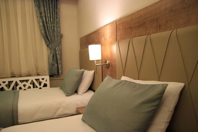 Imagen de la habitación del Hotel Guleryuz Otel. Foto 16