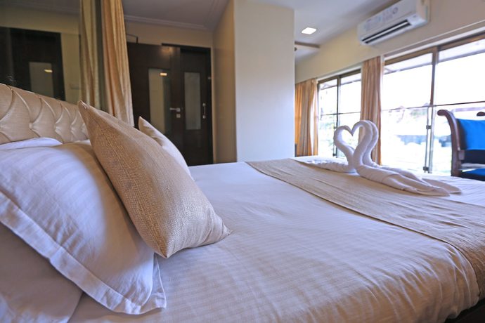 Imagen de la habitación del Hotel Gulf Colaba. Foto 11