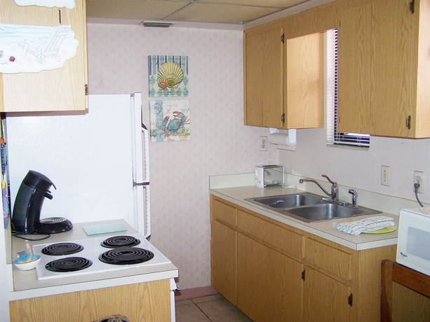 Imagen de la habitación del Hotel Gulf Winds Beach Resort. Foto 6