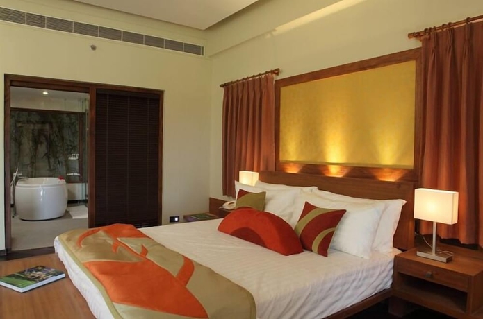 Imagen de la habitación del Hotel Gulmohar Greens - Golf and Country Club. Foto 2