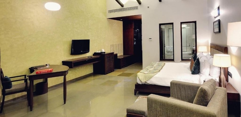 Imagen de la habitación del Hotel Gulmohar Greens - Golf and Country Club. Foto 13