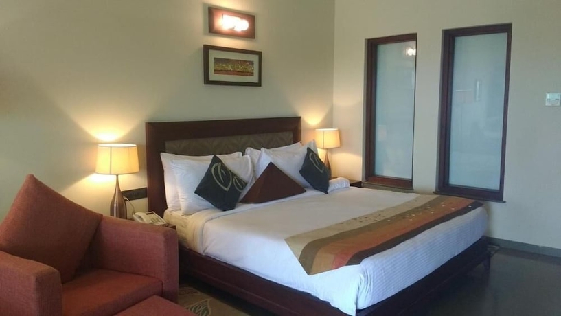 Imagen de la habitación del Hotel Gulmohar Greens - Golf and Country Club. Foto 14