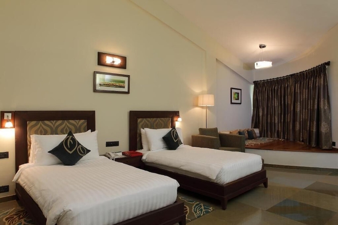 Imagen de la habitación del Hotel Gulmohar Greens - Golf and Country Club. Foto 16