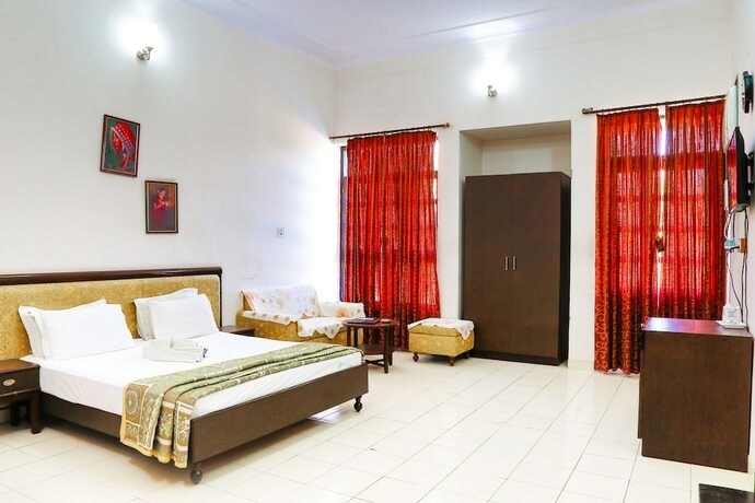 Imagen de la habitación del Hotel Gulmohar Sariska Resort. Foto 17