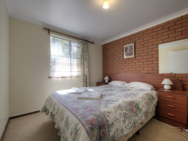 Imagen de la habitación del Hotel Gum Grove Chalets. Foto 17