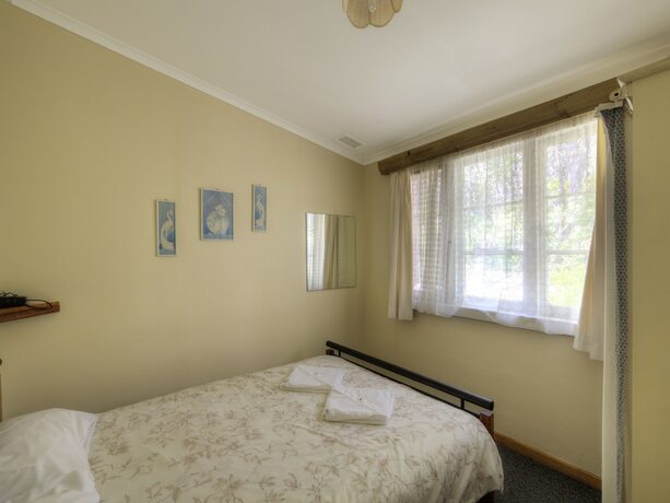 Imagen de la habitación del Hotel Gum Grove Chalets. Foto 21