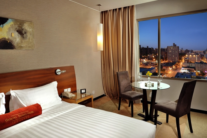 Imagen de la habitación del Hotel Gumaya Tower Semarang. Foto 5