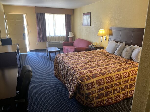 Imagen de la habitación del Hotel Gun Barrel Executive Inn. Foto 13