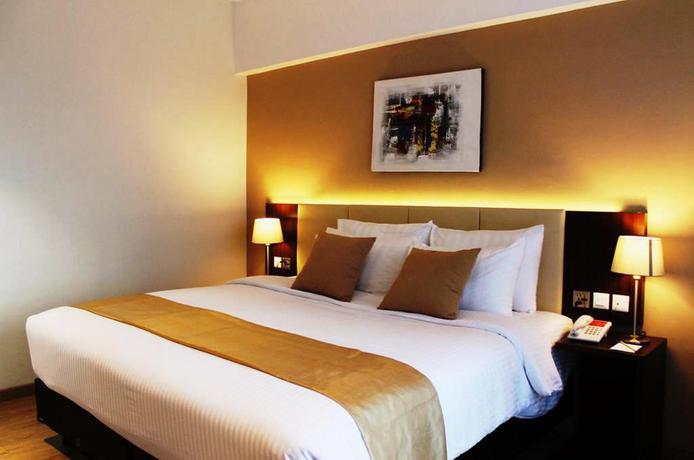 Imagen de la habitación del Hotel Gunawangsa MERR. Foto 6