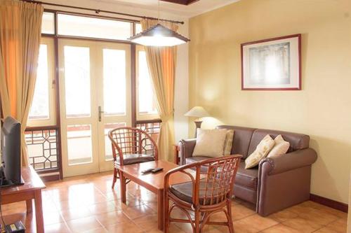 Imagen de la habitación del Hotel Gunung Geulis Cottages managed by Royal Tulip. Foto 5