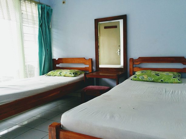 Imagen de la habitación del Hotel Gunung Slamet. Foto 10