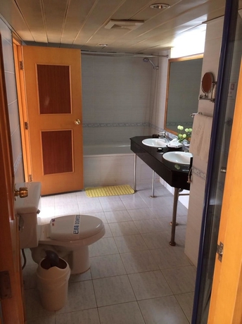 Imagen de la habitación del Hotel Guo An - Beijing. Foto 5