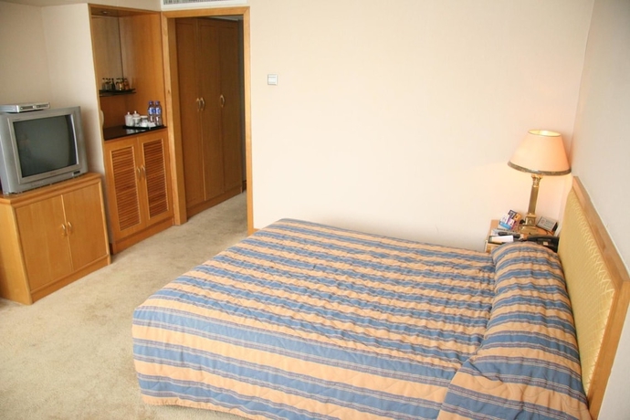 Imagen de la habitación del Hotel Guo An - Beijing. Foto 8